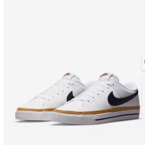 Nike Women’s White Low-Top Sneakers with Black Swoosh and Gold Trim